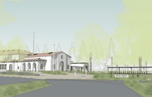 Architectural rendering of a planned development featuring mediterranean-style buildings surrounded by trees with 