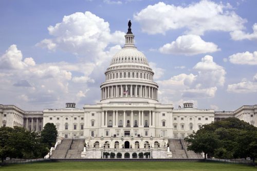 The united states capitol building in washington, d.c., viewed from the front on a cloudy day.