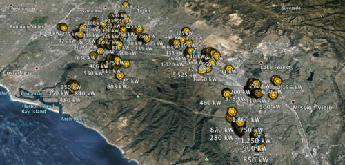 Aerial map view showing santa ana, california, overlaid with numerous yellow icons indicating various power output values in kilowatts, ranging from 250kw to 1020kw.