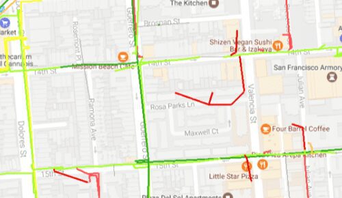 Map image showing streets and landmarks in a san francisco neighborhood with highlighted routes in red and green.