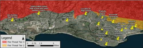 Map showing fire threat tiers in a coastal area with marked school locations, differentiated by color intensity for threat levels.