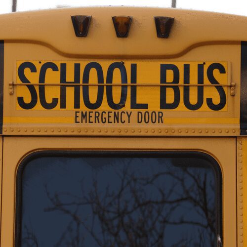 Yellow school bus emergency door.