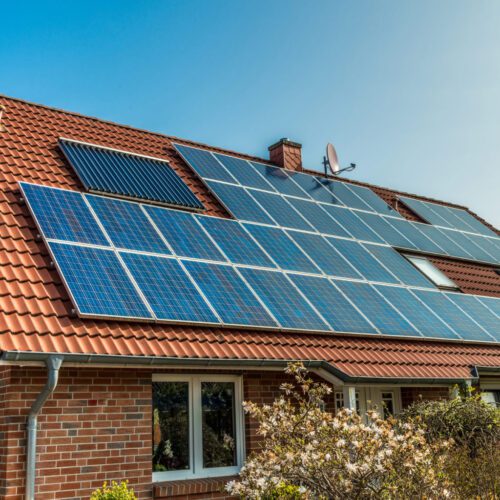 A house with solar panels on the roof.