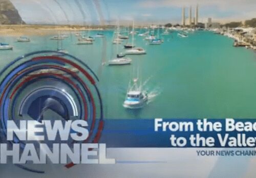 A news channel with boats in the water.