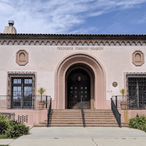 A building with steps leading to the entrance.