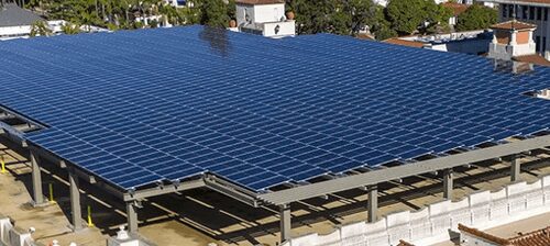 Large array of rooftop solar panels.