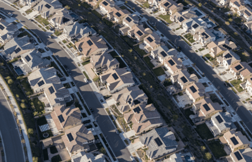 Aerial view of suburban housing development.
