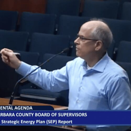 Man speaking at county board meeting
